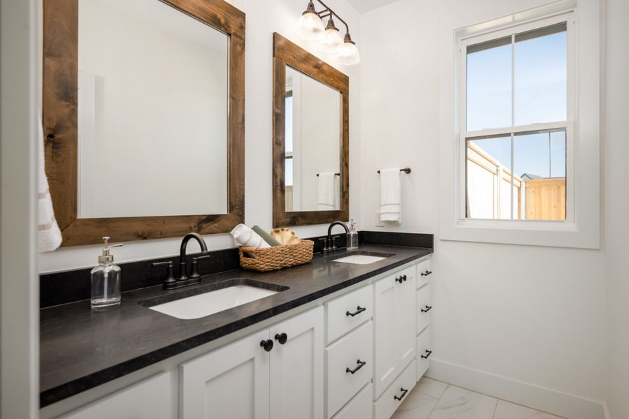 Furnished interior in a model home at Greens Prairie Reserve in College Station (Image 32).