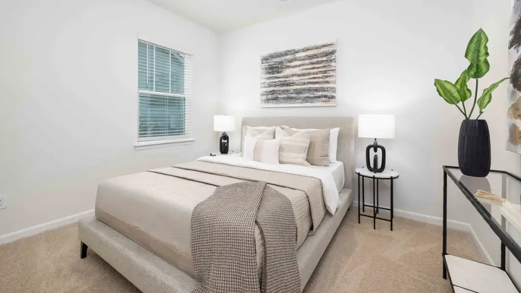 Furnished interior in a model home at Sweetwater Village in Rockwell (Image 21).