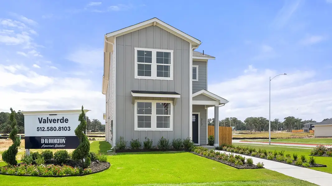 Front exterior of a home in the Valverde community, located in Bastrop, TX (Image 10). Front exterior of a home in the Valverde community, located in Bastrop, TX (Image 10).