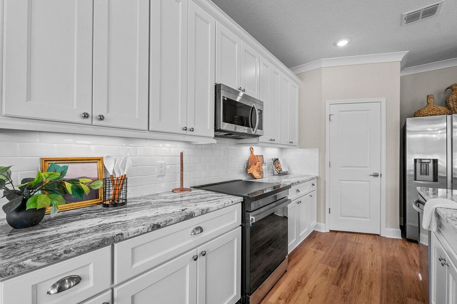 Furnished interior in a model home at Friedrich Hill in San Antonio (Image 43).