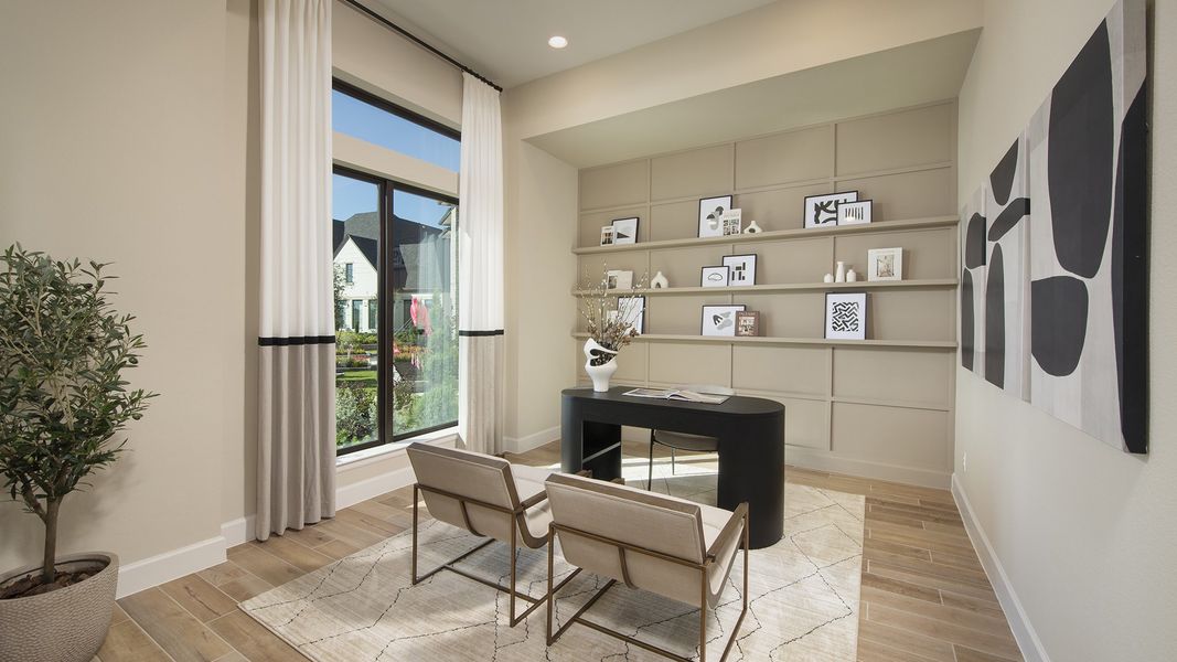 Furnished interior in a model home at Cross Creek West 55' in Fulshear (Image 7).