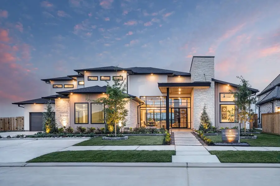 Front exterior of a home in the Bridgeland community, located in Cypress, TX (Image 4).
