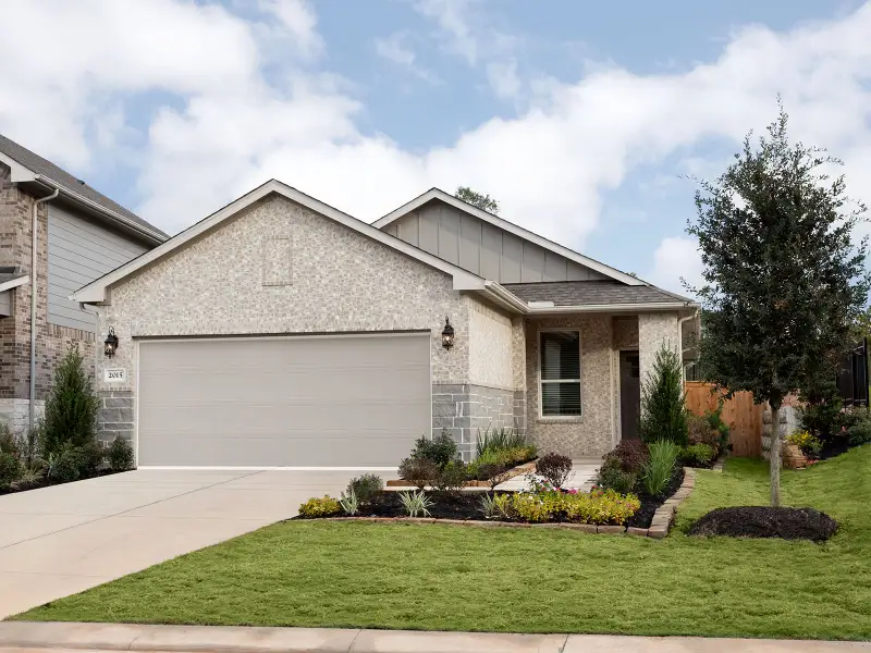 Front exterior of a home in the Montgomery Oaks - Premier community, located in Conroe, TX (Image 3).