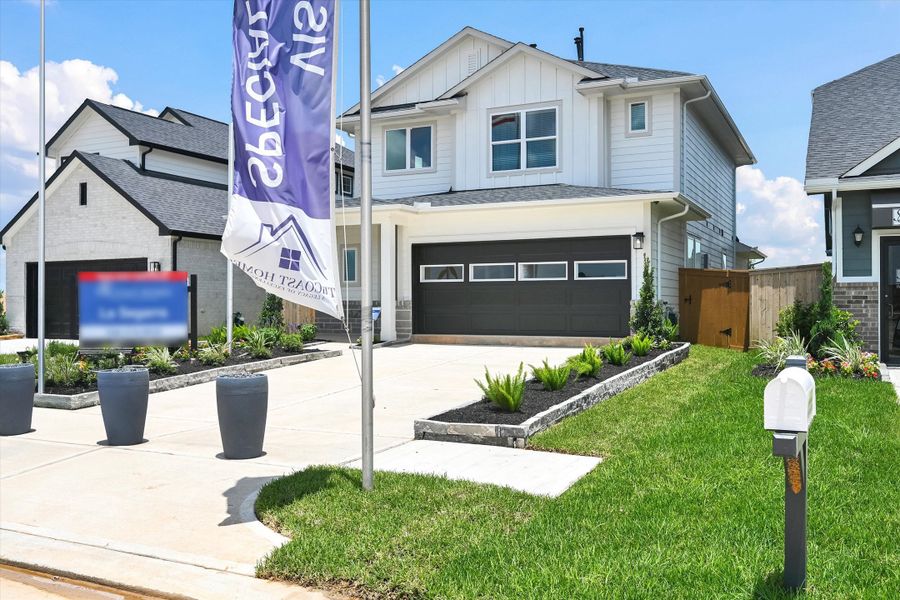 Front exterior of a home in the La Segarra 40' community, located in Brookshire, TX (Image 8). Front exterior of a home in the La Segarra 40' community, located in Brookshire, TX (Image 8).