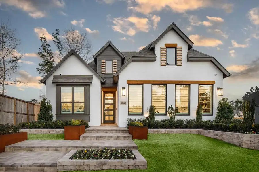 Front exterior of a home in the Evergreen community, located in Conroe, TX (Image 4). Front exterior of a home in the Evergreen community, located in Conroe, TX (Image 4).