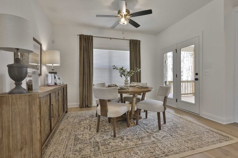 Furnished interior in a model home at Ellerbe in Newnan (Image 17).