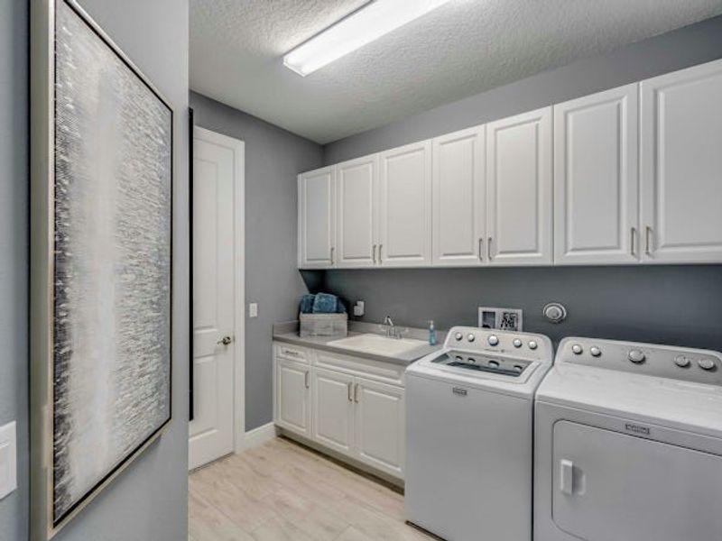 Furnished interior in a model home at High Pointe in Vero Beach (Image 75).