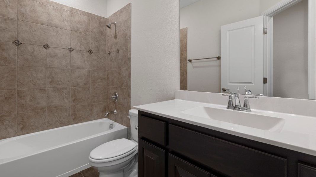 Furnished interior in a model home at Eden Ranch in Arlington (Image 20).