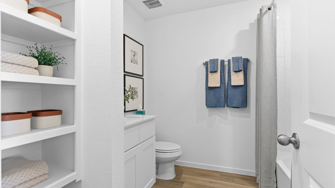 Furnished interior in a model home at Caldwell Crossing in Iowa Colony (Image 23).