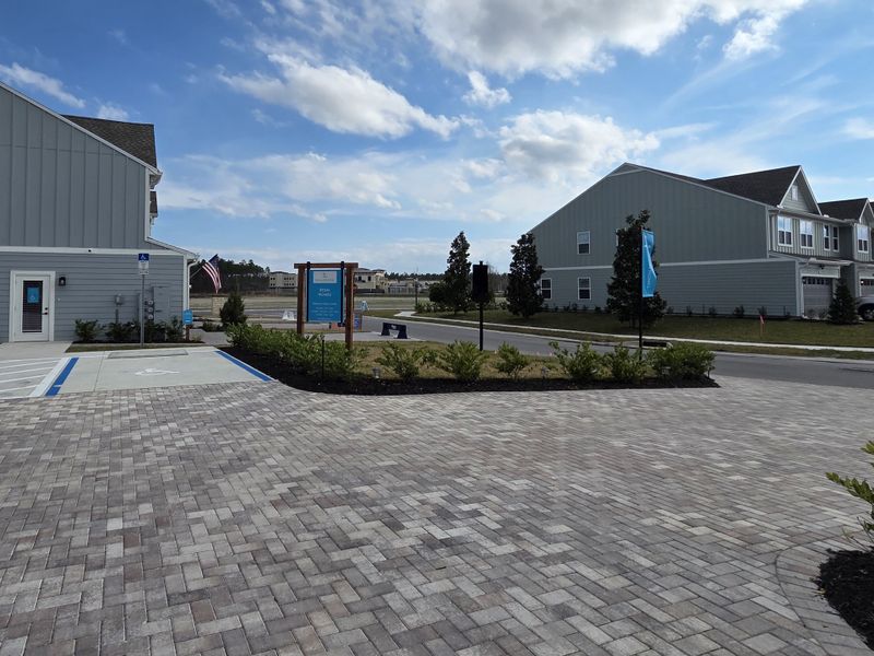 A modern facade and neat landscaping in Shearwater Townhomes by Ryan Homes, St. Augustine, FL.