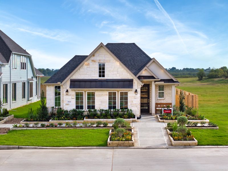 Front exterior of a home in the Ellwood: Heritage Collection community, located in Iowa Colony, TX (Image 10).