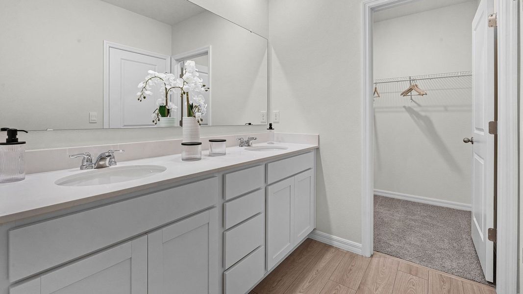 Furnished interior in a model home at Fish Lake Cove in Kissimmee (Image 16).