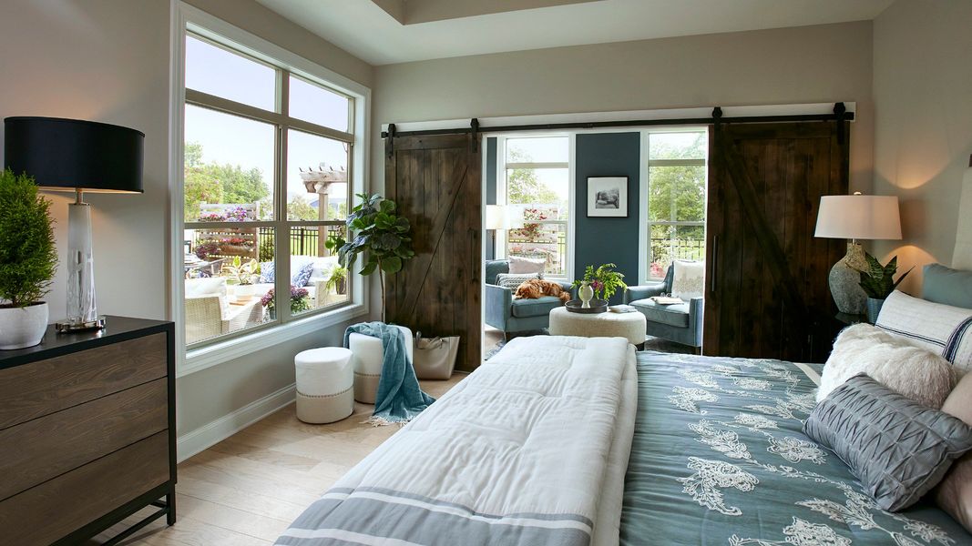 Furnished interior in a model home at The Courtyards by The Manor in Alpharetta (Image 8).