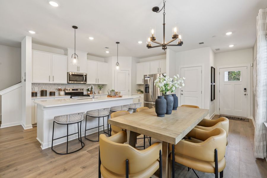 Furnished interior in a model home at Cedarcrest Townhomes in Fairview (Image 8).