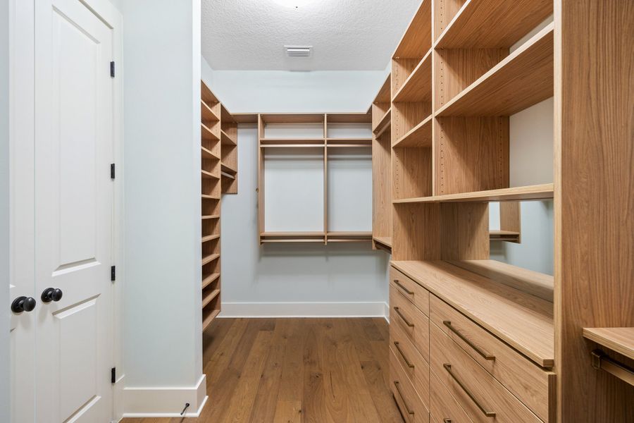 Furnished interior in a model home at Hidden Creek at SilverLeaf 80' Gold Series in St. Augustine (Image 74).