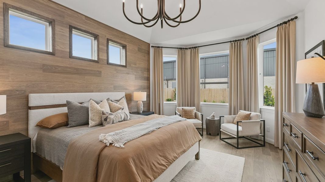 Bask in luxury with wood accents and modern lighting in Beamer Villas’ premier bedroom. Bask in luxury with wood accents and modern lighting in Beamer Villas’ premier bedroom.