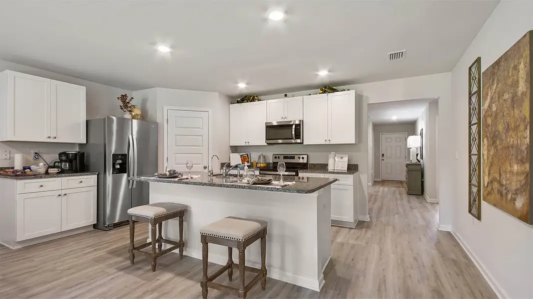 Furnished interior in a model home at Sunny Hills in Chipley (Image 9).