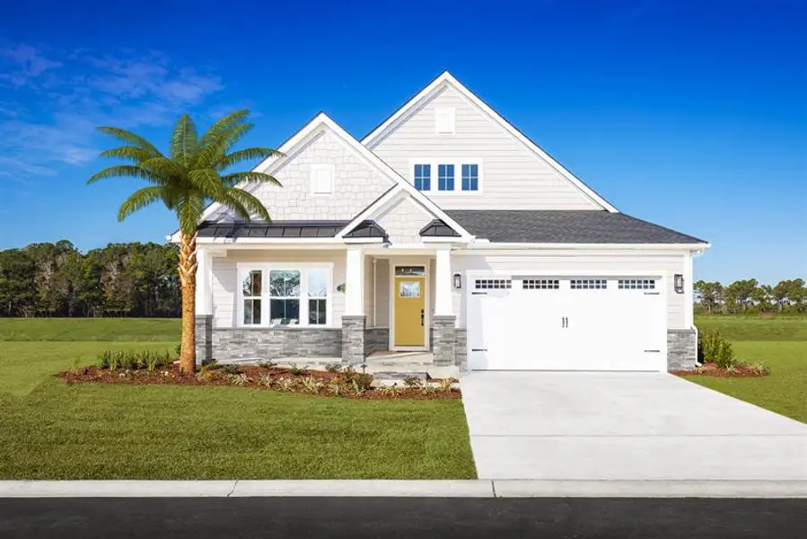 Front exterior of a home in the Grande Dunes North Village Estates community, located in Myrtle Beach, SC (Image 3).