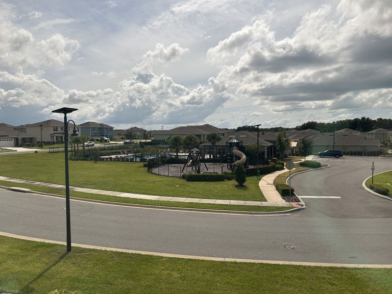 A picturesque community with landscaped lawns and playground in Timberwalk by D.R. Horton, Mount Dora, FL.