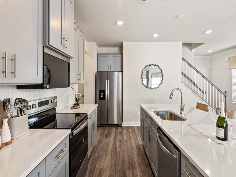 Furnished interior in a model home at Russell Grove - Rolling Hills Series in Charlotte (Image 4).