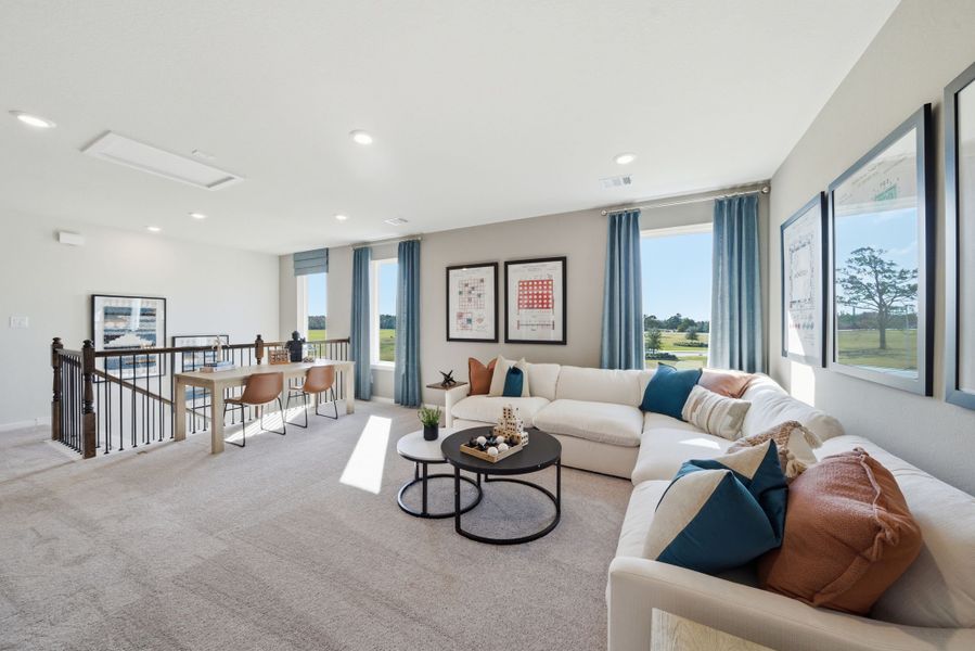 A living room with a large window.