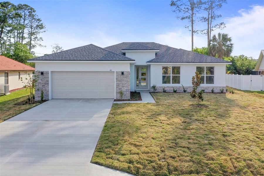 Front exterior of a home in the Ocala Waterways community, located in Ocala, FL (Image 7).