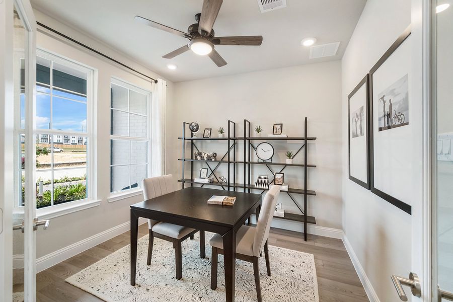 Furnished interior in a model home at Sienna in Missouri City (Image 10).