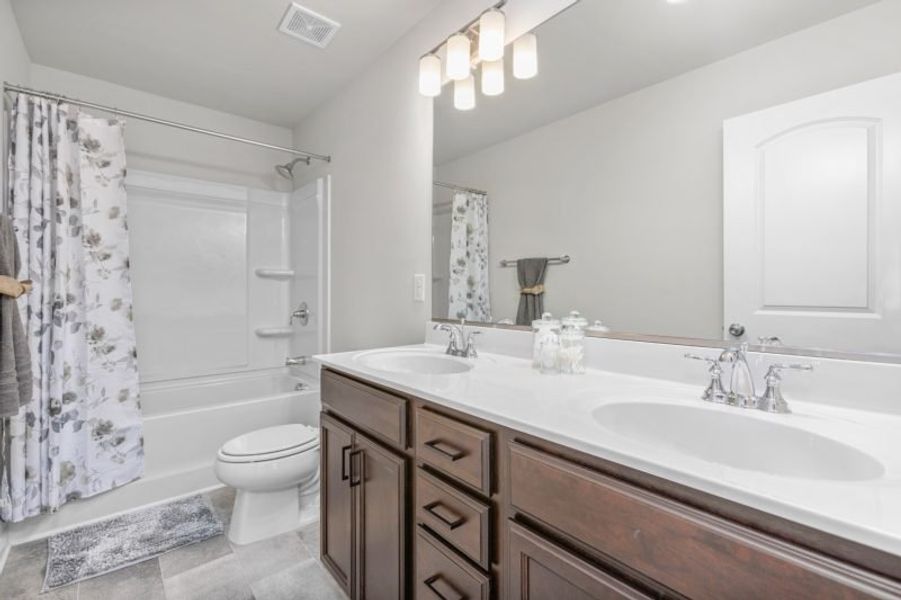 Furnished interior in a model home at The Wilcox in Greensboro (Image 59).