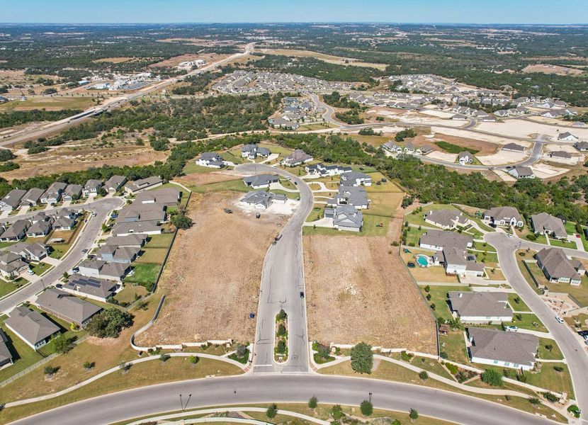 Aerial view of the Santa Rita Ranch – Estate Homes community in Liberty Hill, TX, showing layout and nearby surroundings (Image 1). Aerial view of the Santa Rita Ranch – Estate Homes community in Liberty Hill, TX, showing layout and nearby surroundings (Image 1).