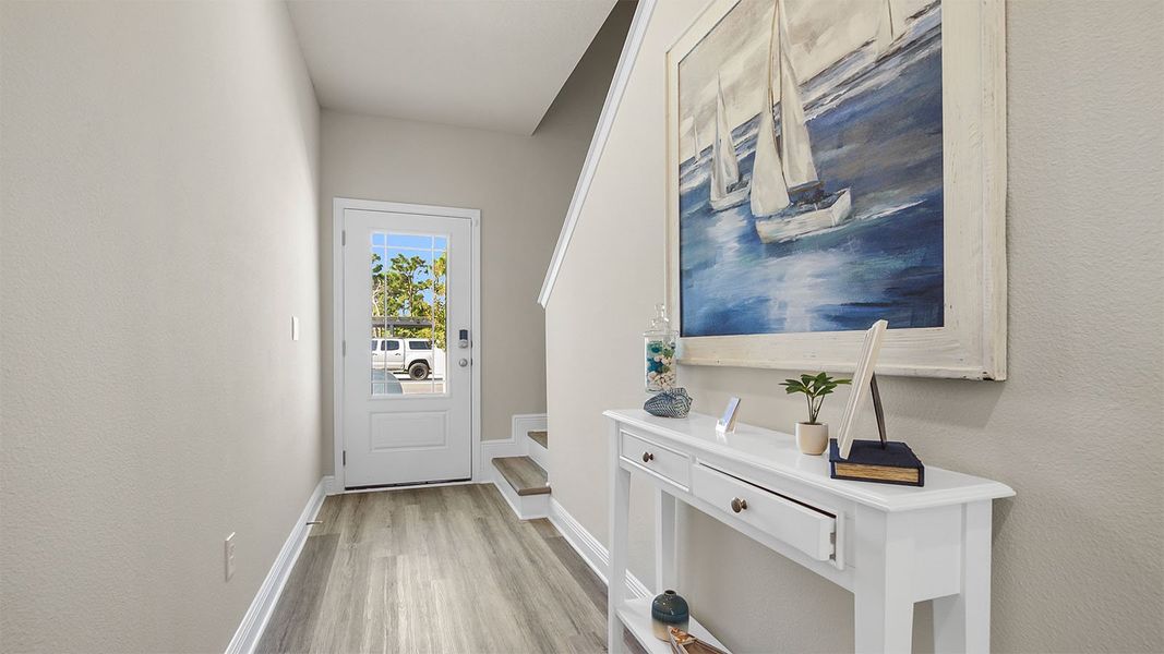 Furnished interior in a model home at Caballeros Estates Townhomes at Hombre in Panama City Beach (Image 11).