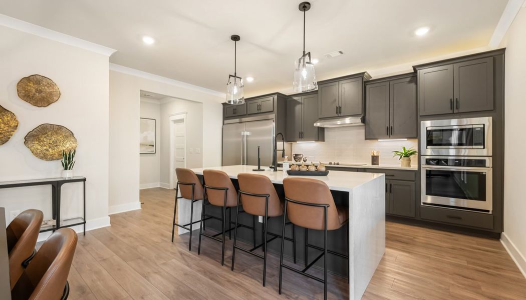 Furnished interior in a model home at Pinecrest Ridge in Dacula (Image 19).