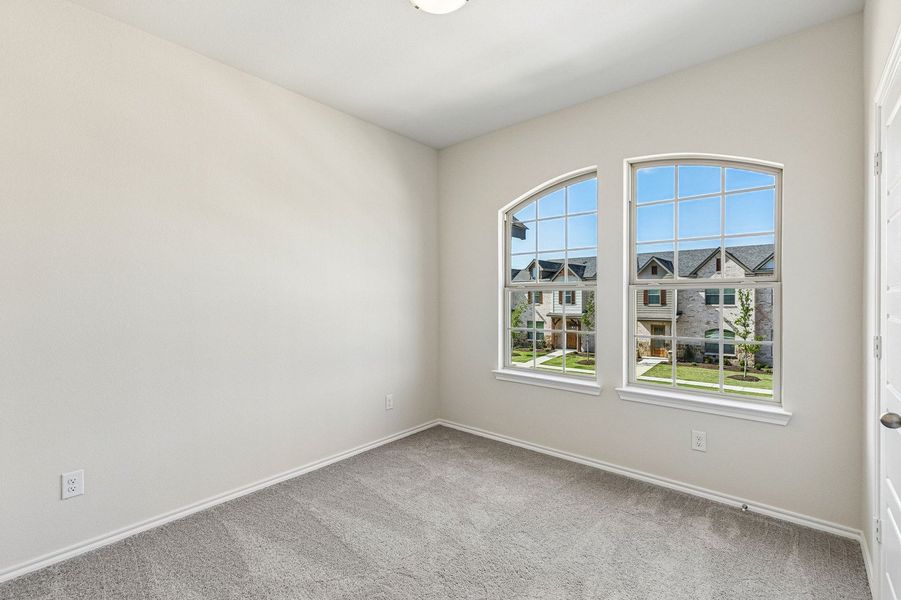 Front exterior of a home in the Sanger Circle – Townhomes community, located in Sanger, TX (Image 27).