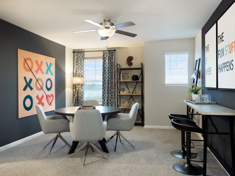Furnished interior in a model home at Opal Meadows in Kyle (Image 20).