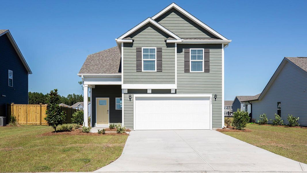 Front exterior of a home in the Sidbury Station community, located in Castle Hayne, NC (Image 3). Front exterior of a home in the Sidbury Station community, located in Castle Hayne, NC (Image 3).