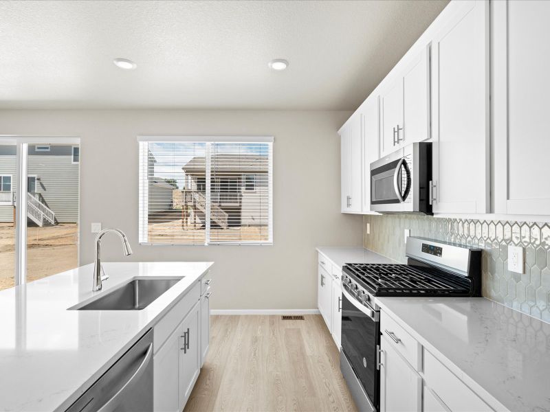 The Evergreen floorplan interior image taken at a Meritage Homes community in Northern Colorado.