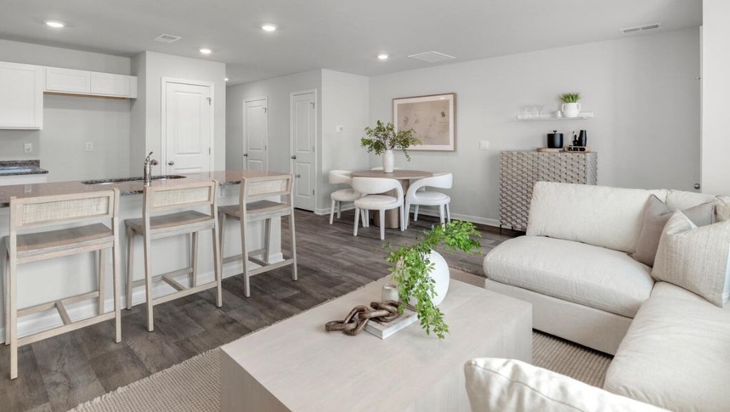 Furnished interior in a model home at Waterside Townhomes in Surf City (Image 14).