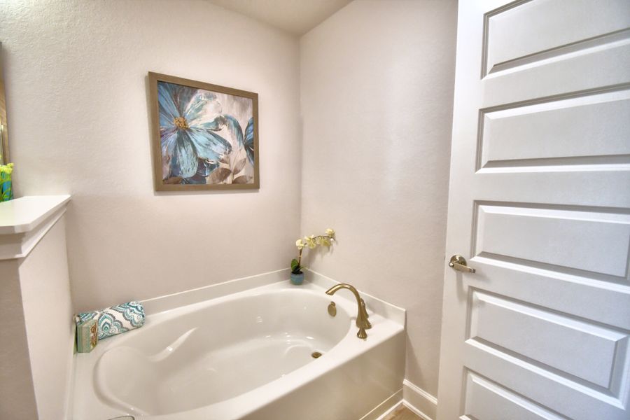 Furnished interior in a model home at Citrus Landing in Davenport (Image 32).