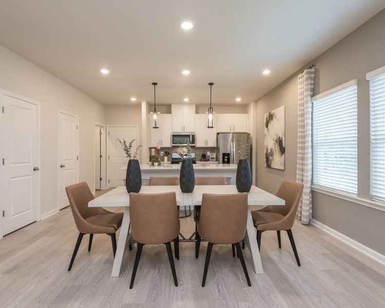 Gather friends and family for a meal in this spacious dining room.