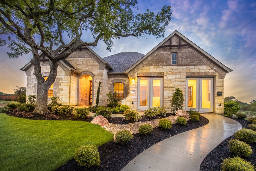Front exterior of a home in the Oaks at San Gabriel community, located in Georgetown, TX (Image 5).