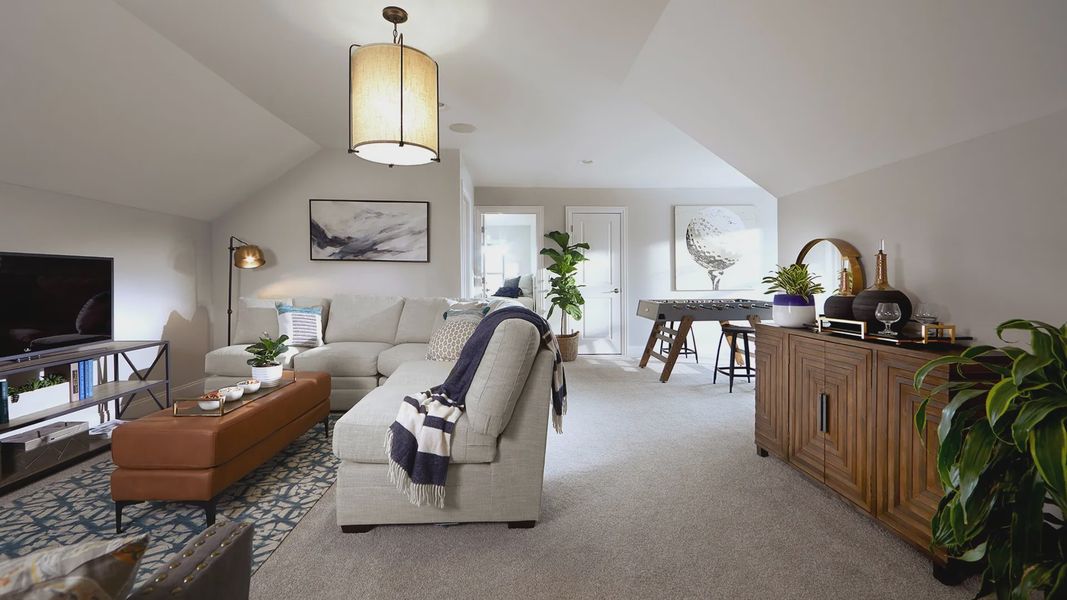 Furnished interior in a model home at The Courtyards at Hodges Farm in Charlotte (Image 9).