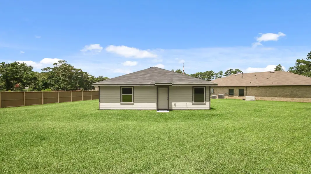Front exterior of a home in the Mill Creek community, located in Magnolia, TX (Image 6).