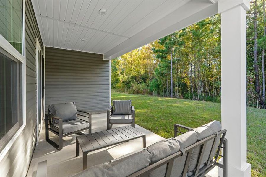 A COVERED PORCH PERFECT FOR MORNING COFFEE, EVENING CHATS, AND EVERYTHING IN BETWEEN A COVERED PORCH PERFECT FOR MORNING COFFEE, EVENING CHATS, AND EVERYTHING IN BETWEEN