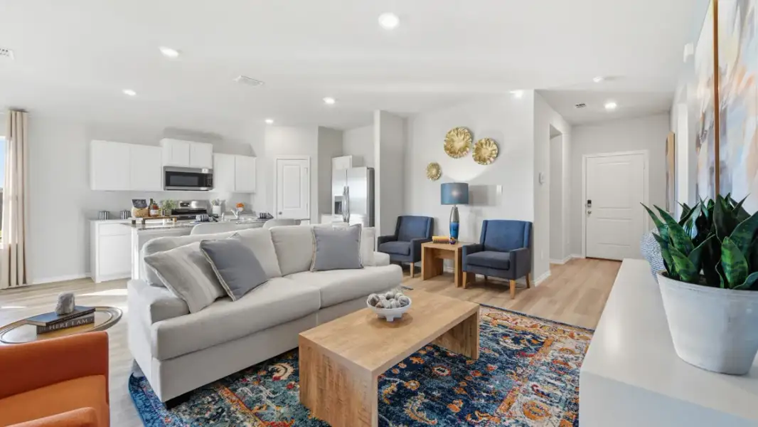 Furnished interior in a model home at Webster Meadows in Ponder (Image 9).