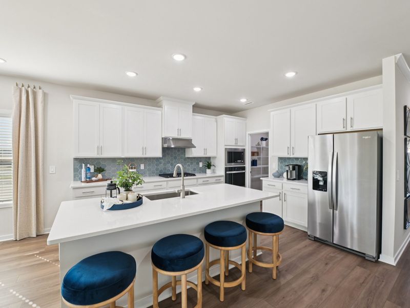 Furnished interior in a model home at Marshburn Landing - Signature Series in Wendell (Image 3).
