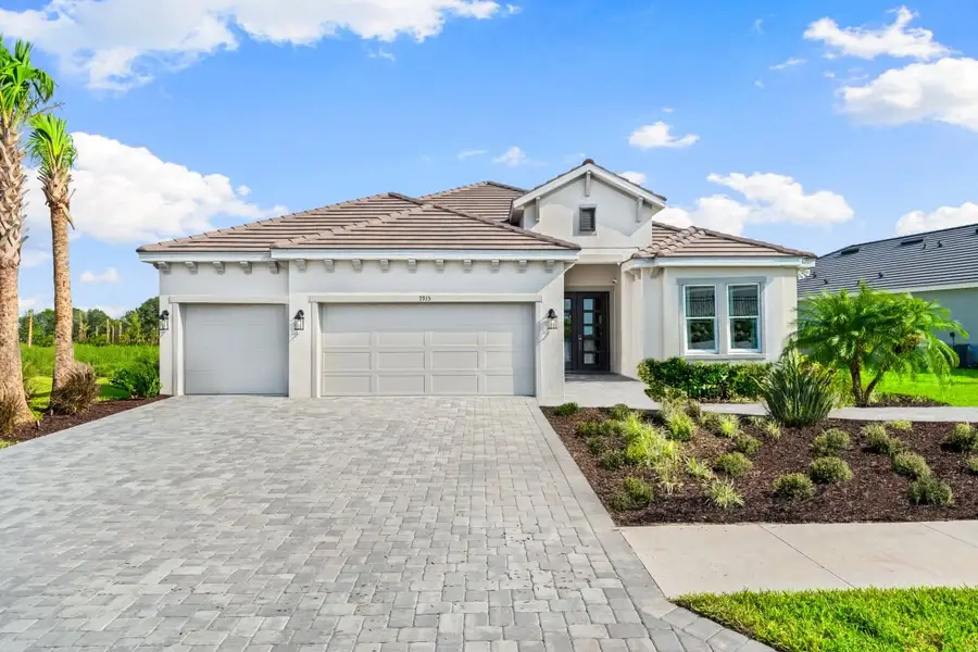 Front exterior of a home in the Esplanade at Cammaray Lakewood Ranch community, located in Sarasota, FL (Image 4). Front exterior of a home in the Esplanade at Cammaray Lakewood Ranch community, located in Sarasota, FL (Image 4).
