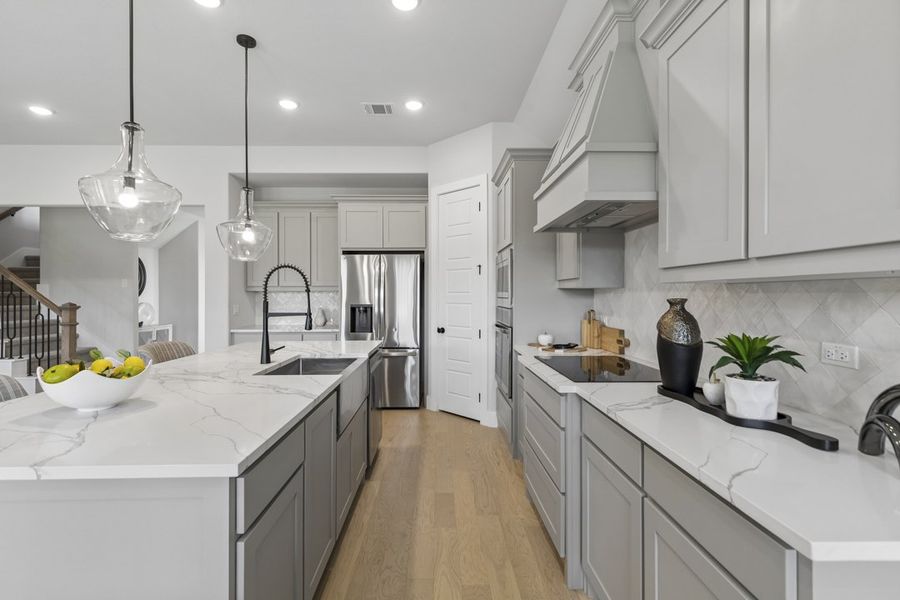 Furnished interior in a model home at Ten Mile Creek in DeSoto (Image 8).