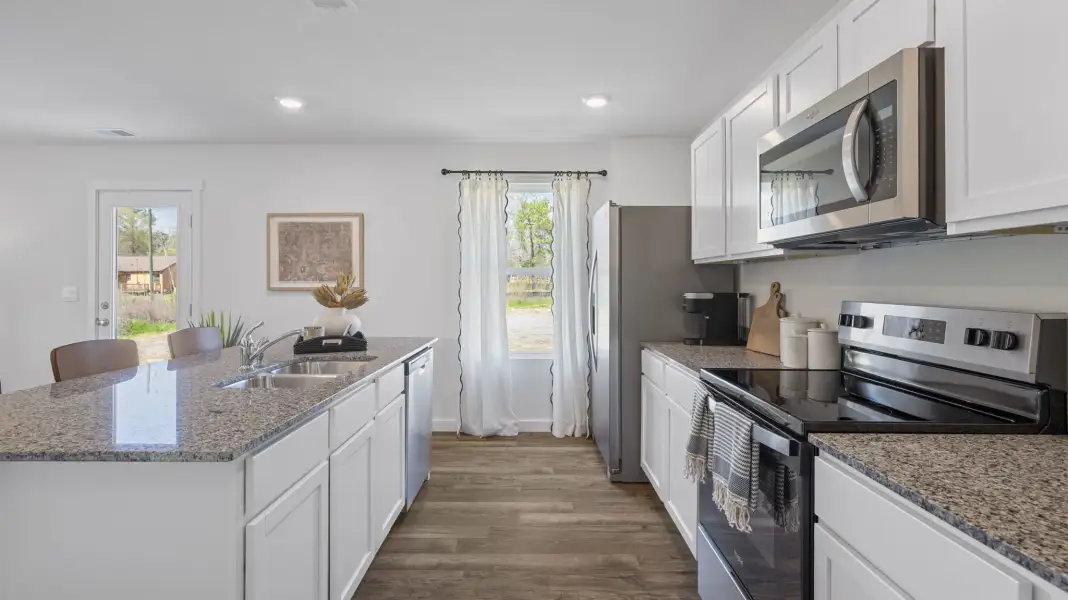 Furnished interior in a model home at Holloway Farms in Cleveland (Image 12).