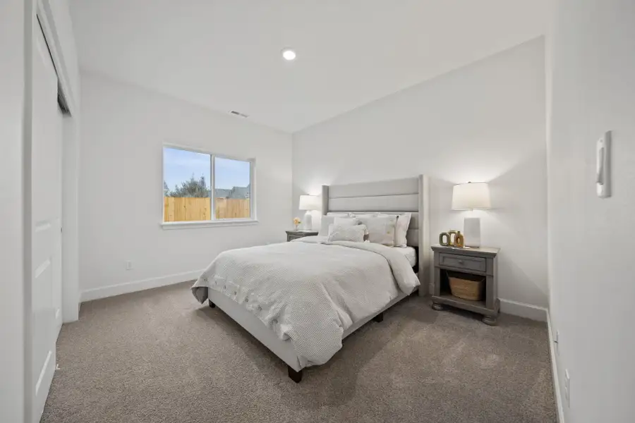 Furnished interior in a model home at Rosengarth Estates in Bend (Image 20).