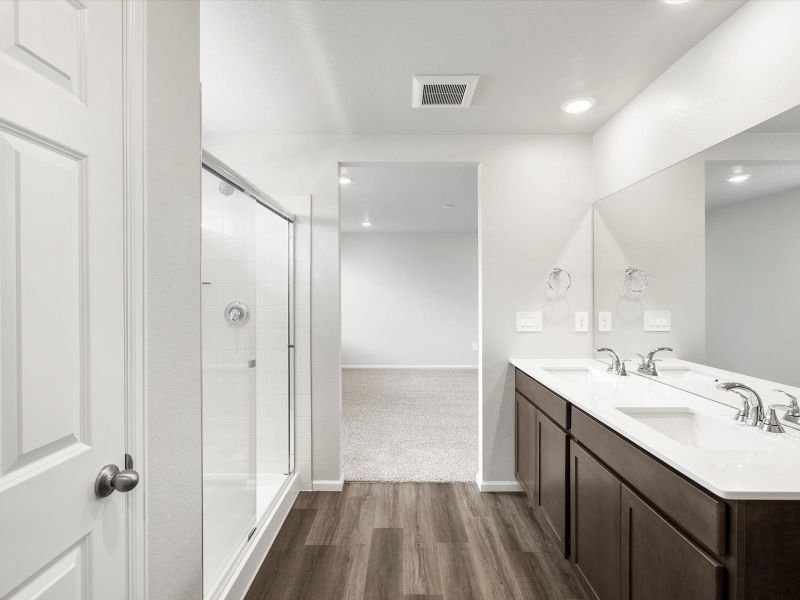Furnished interior in a model home at Frontier Estates - The Flora Collection in Firestone (Image 18).