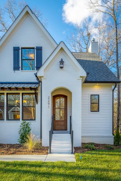 Front exterior of a home in the Hidden River community, located in Signal Mountain, TN (Image 13).